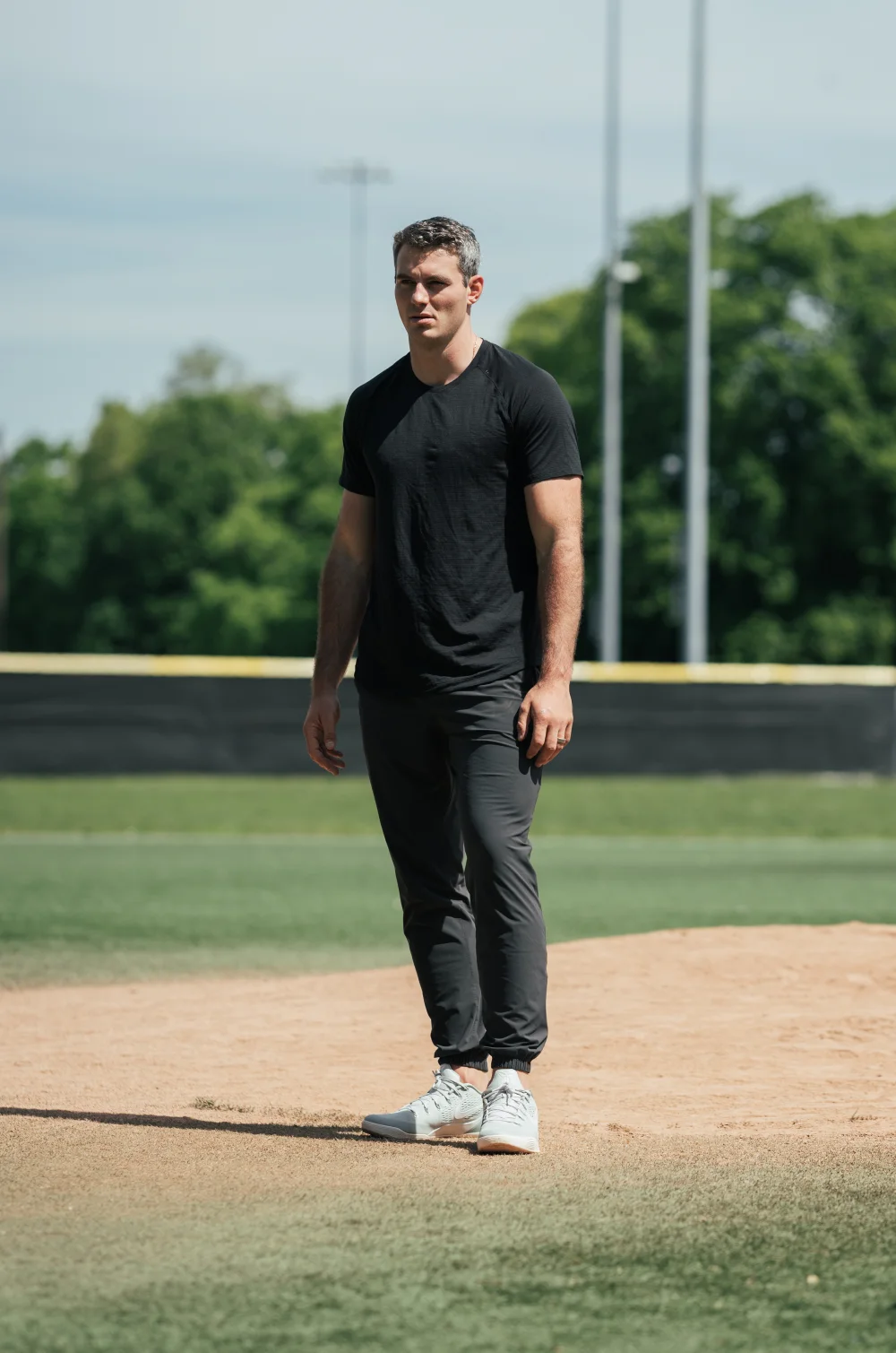 Clayton Thompson standing on a baseball field